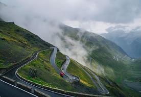 winding Highway on mountain side, scenic landscape, Italy