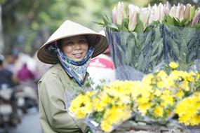 street flower seller in Hanoi, Vietnam