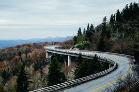 asphalt road winding on a mountain