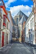 aged church on historical street, Belgium, Brugge