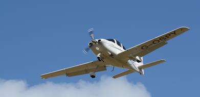 private jet against blue sky