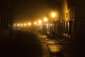 city street lighting in the fog