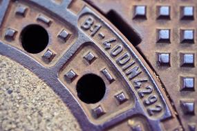 closeup view of metal manhole cover