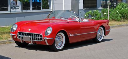 old red Chevrolet Corvette