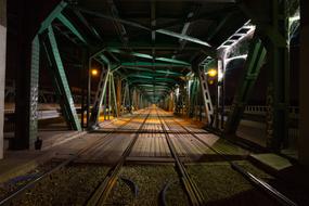 Beautiful train bridge with colorful light in the darkness