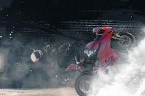 motorcycle stunts in a mystical landscape