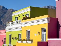 Colorful and beautiful Bo-Kaap homes on the Wale Street, near the mountains in Cape Town, South Africa