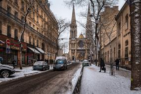 Beautiful street of Paris with snow