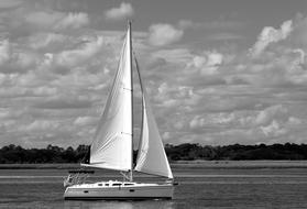 Black and white photo of the sailboat on the river