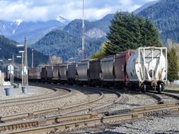 Train on the railway among the hills