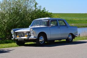 Peugeot 404 parked on a sunny day