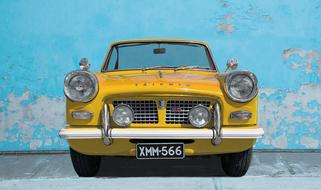 yellow Triumph Car