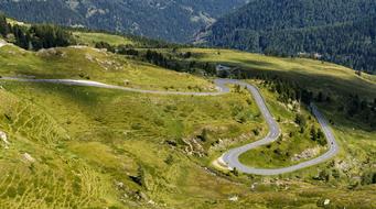 Road Curves on mountain side at scenic summer landscape, austria, carinthia