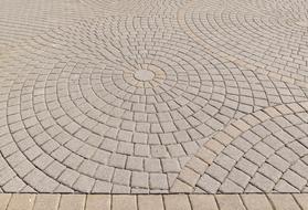 Close-up of the patch of the paving stones, in the circle, on the street