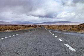 endless Road beneath low clouds, uk, Scotland