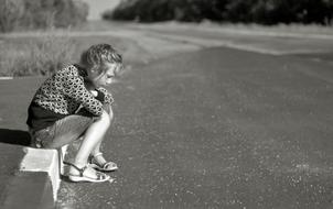 Girl on Road sitting