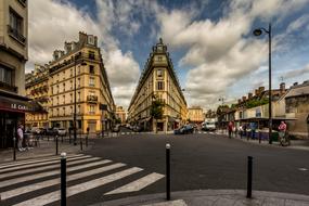Perspective of historical street with flat iron buildings, france, Paris