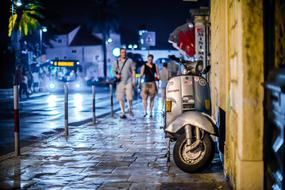 Tourists walk along the street in Dubrovnik, Croatia