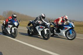 Speed Racing Motorcycle on an asphalt highway on a sunny day