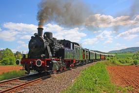 retro steam locomotive on the railroad in germany