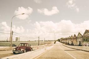 vintage car on the side of the road