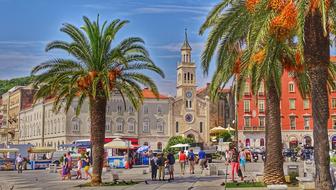 tourists on square in old city