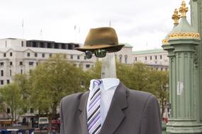 silhouette of a man without a face in the city