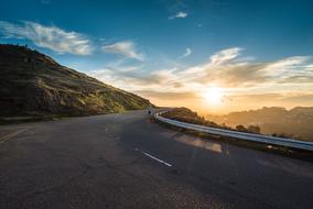 light of the morning sun on a mountain highway