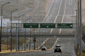 car rides on multi-lane highway