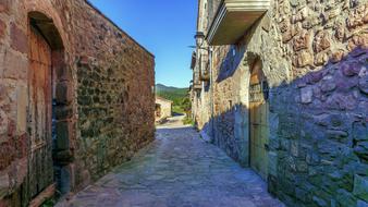 road near stone houses