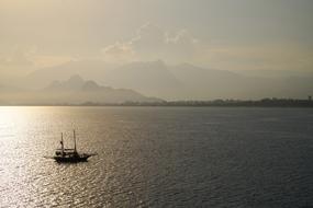 sailboat on the brilliant evening sea