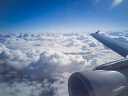 Plane Window white clouds