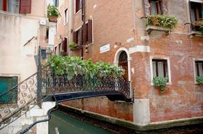 porch of a house across a canal in Venice, Italy