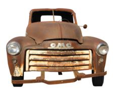 Oldtimer rusty car with GMC logo at white background