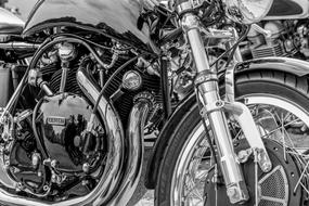 Vincent Motorcycle in black and white background close up