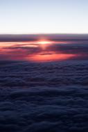 colorful sunset over the clouds