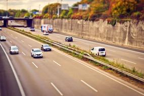 photo of cars on the highway