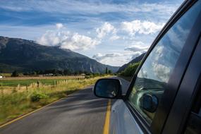 Car and Clouds Mountains