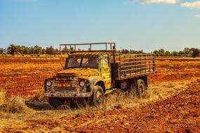 old rusty truck on a rural field