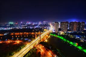 illuminated bridge in colorful night Cityscape