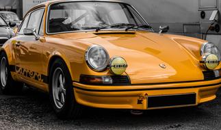 orange Porsche Carrera Rs