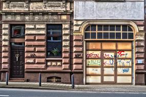 photo of the facade of an abandoned historic building