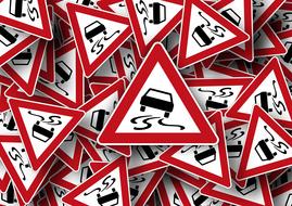 slippery road signs in pile drawing