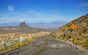 road sign on a road in arizona