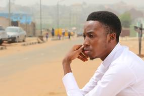 handsome young african man Thinking