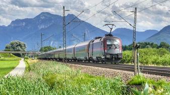 the movement of the train against the background of the mountains