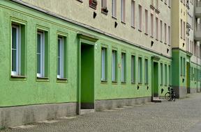 cityscape of green House and Street