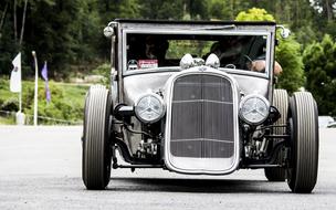american vintage car with round headlights