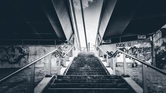 monochrome photo of stairs from metro in city