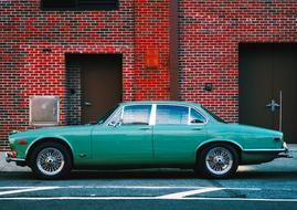 retro green jaguar car